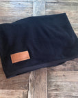 Navy organic cotton fly rug, folded